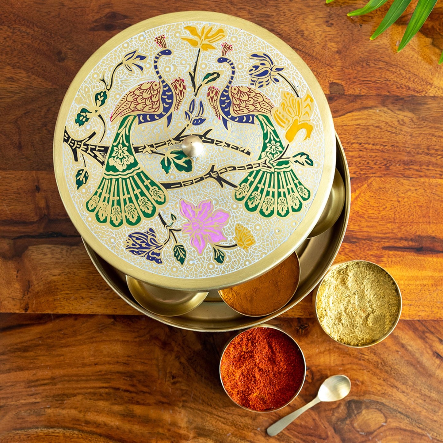 “The Royal Plumage” – Handpainted Brass Spice Box (7 Containers, 110 ml)