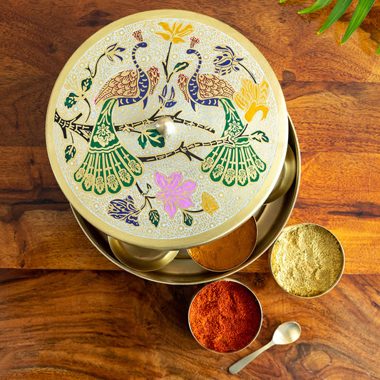 “The Royal Plumage” – Handpainted Brass Spice Box (7 Containers, 110 ml)